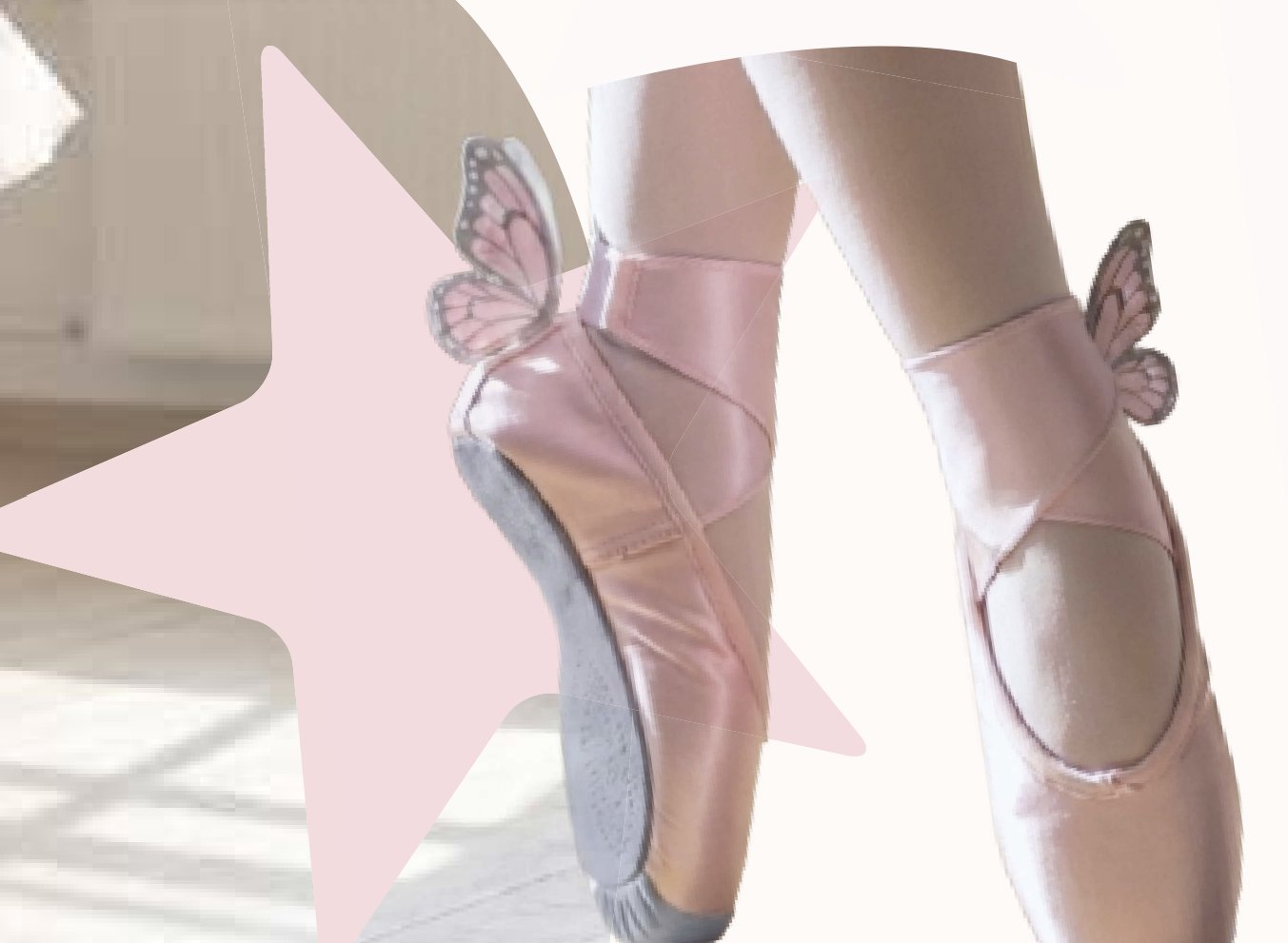 StarStep pointe shoes on pointe with pink butterfly clips at the heel